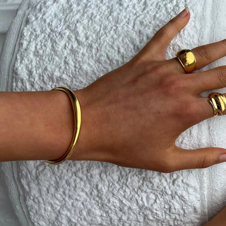 Armbånd, åben armring, 24 k forgyldt og forsølvet zamak, 17 cm, justerbar 