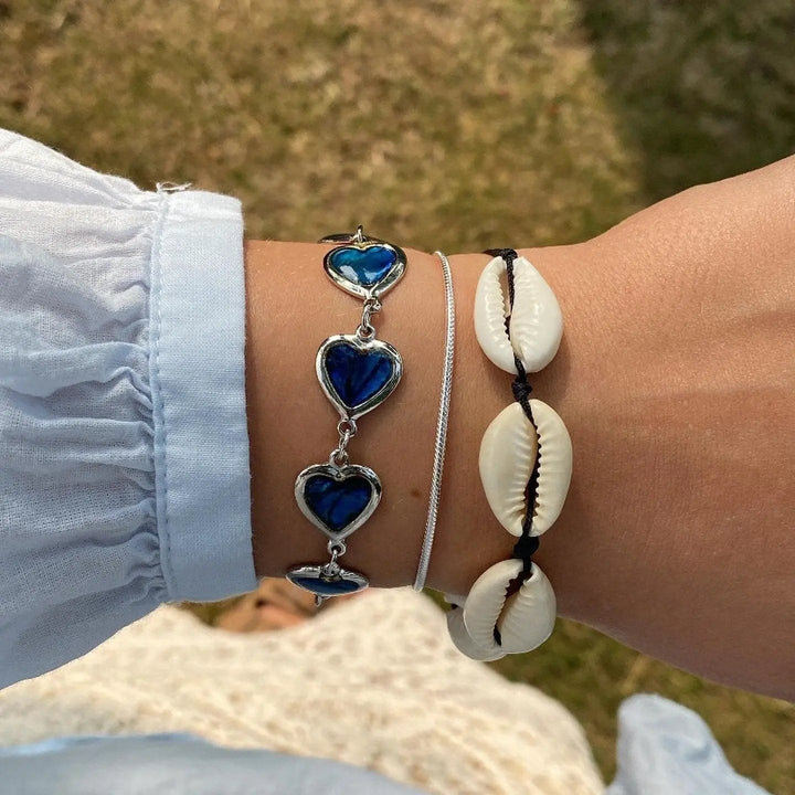 Find Armbånd med blomster, stjerner og firkantede-led i forsølvet kobber blandt vores store udvalg af  Armbånd hos  Beadhouse of Copenhagen i dag. Husk gratis fragt over 400kr