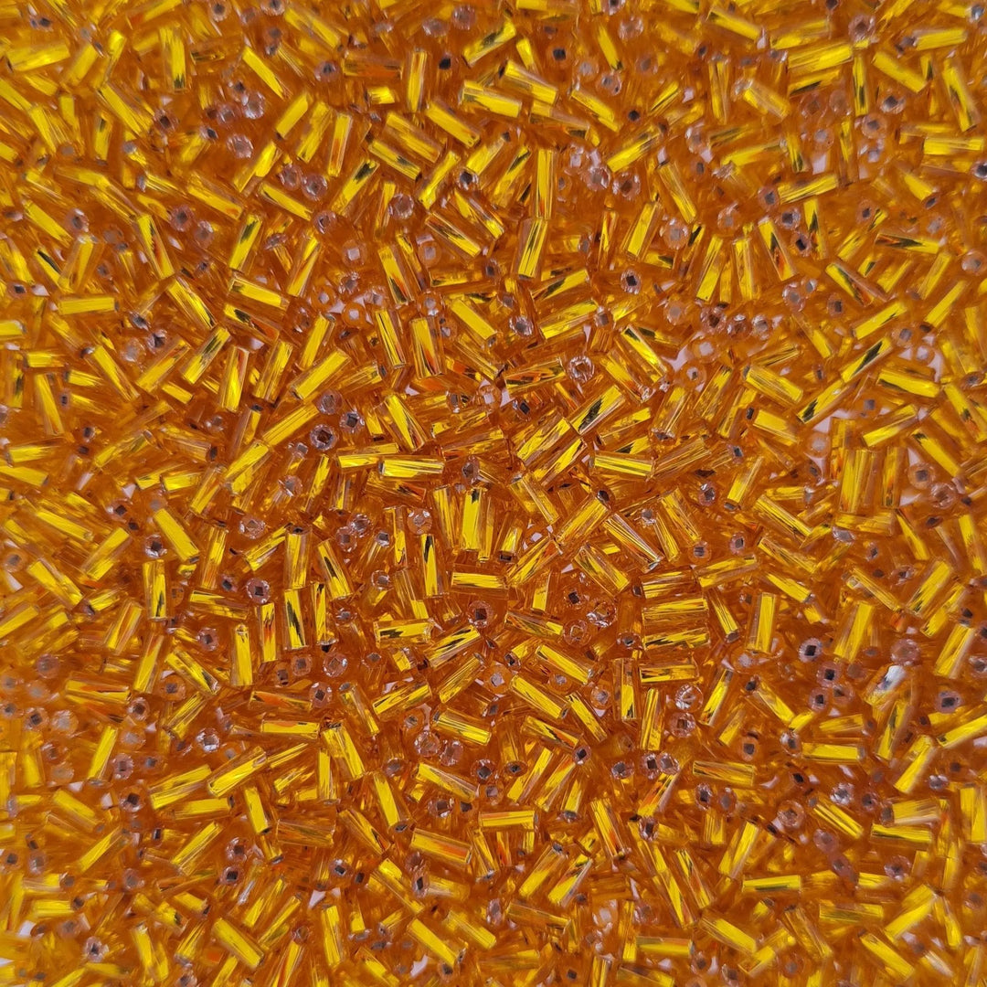 Guld glasperler, preciosa cut bugles, twisted silverlined shiny amber, 4,6 mm Preciosa BOC
