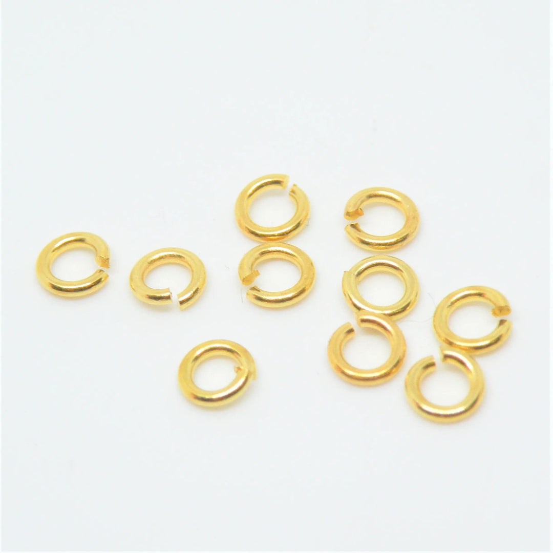 Øskner, åbne, messing forgyldt, 5x0,8mm Tax