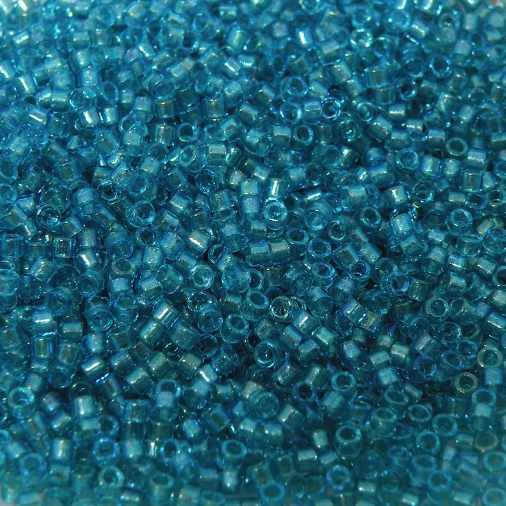 Blå glasperler, miyuki delica beads, fancy lined aqua Krea