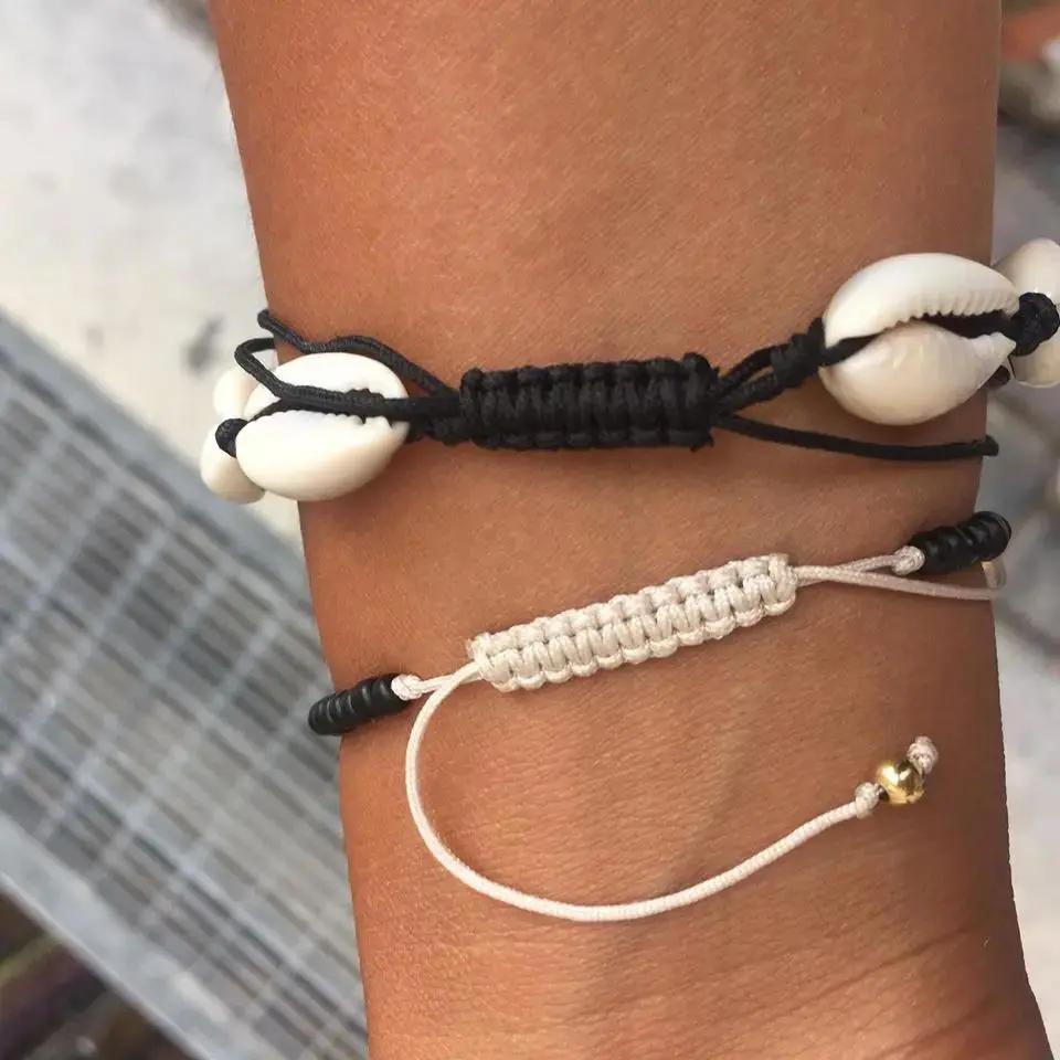 Armbånd, kauri musling 